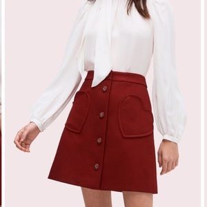 Kate spade ♠️ reddish burgundy skirt with heart ❤️ pockets size 4